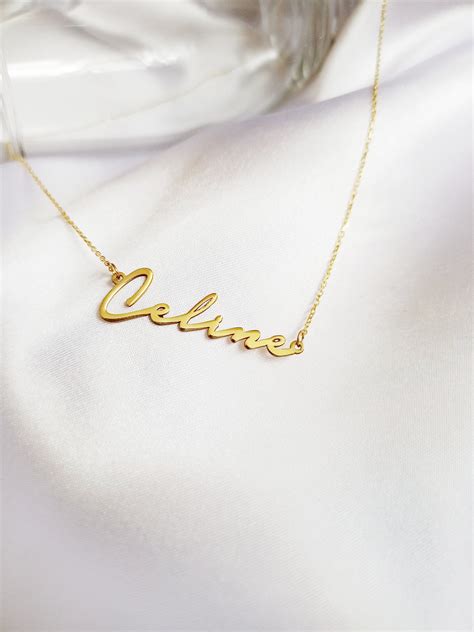 gold name necklace uk.